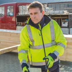 1 Stück ELYSEE Warnschutz-Softshelljacke aus weichem Material in Gelb/Marine, EN ISO 20471/3 zertifiziert